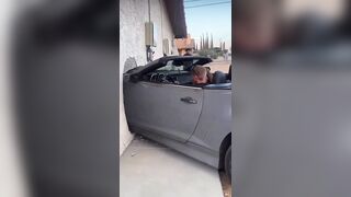 Moment SoCal drunk driver’s passenger flashes unhinged smile after crashing Camaro into wall