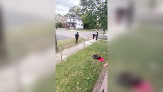 Crazy Black Man Tries To Steal Patrol Car While Carrying a Baby in His Arms