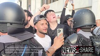 Go back to your country!" Jake Lang yells at counter-protesters in Dearborn