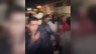 White Liberal Woman celebrates the invasion of thousands of African Men - with the invaders.