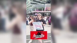 Toronto man confront woman holding Protect Trans Kids sign before yesterday WNBA game