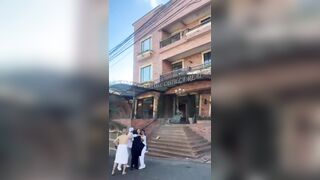 The exact moment the Earthquake in Colombia strikes Man in his Towel