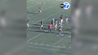 High school football coach fired after kicking a football into the balls of player