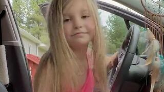 This little girl thinks she can drive