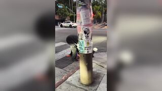 A homeless man was seen stealing food contents from a delivery robot in LosAngeles
