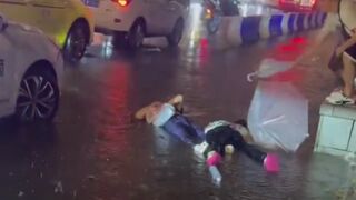Mother and Daughter Tourists Fall into Electrified Puddle Near Hongyadong