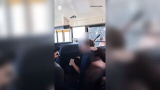 A California mother was arrested after she smashing a school bus window and climbed inside to get her child.