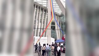 Workers in Mexico City Rip up a Demonic Pride Flag on their Government Building.