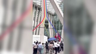 Workers in Mexico City Rip up a Demonic Pride Flag on their Government Building.