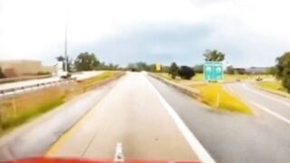 WOW: Big Ass SUV Goes Airborne on I-75