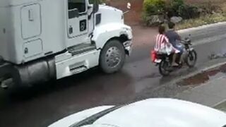 Motorcyclist Slips on Puddle and the Rest is Ugly
