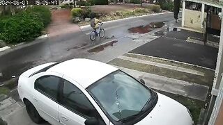Motorcyclist Slips on Puddle and the Rest is Ugly