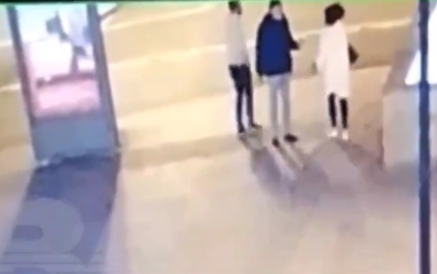 Girl in Fight with her Man Lies Down under Bus...Or was She Kicked