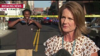 UNREAL: Somali man flashes gang signs behind a reporter covering a Minneapolis shooti