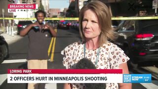 UNREAL: Somali man flashes gang signs behind a reporter covering a Minneapolis shooti