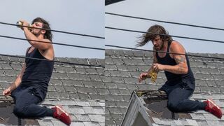 Man who wont get off the roof is bribed by police with what appear to be Twisted Teas