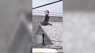 Man who wont get off the roof is bribed by police with what appear to be Twisted Teas