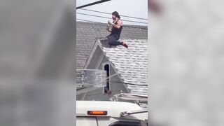 Man who wont get off the roof is bribed by police with what appear to be Twisted Teas