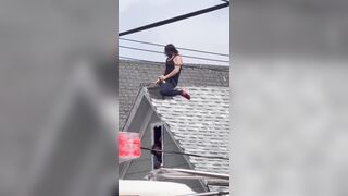 Man who wont get off the roof is bribed by police with what appear to be Twisted Teas