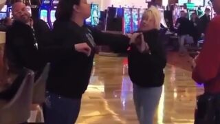 Woman makes sure she can fire back. Wait for it