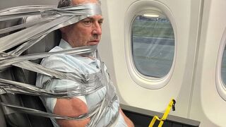 passenger was duct-taped to his seat on an American Airlines flight after allegedly..
