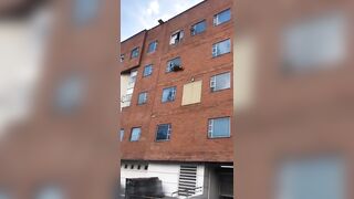 Heavy Set Woman Jumps from Window, Splits Her Head Open