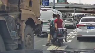 Couple Nearly Crushed by Truck in Heart-Stopping Close Call