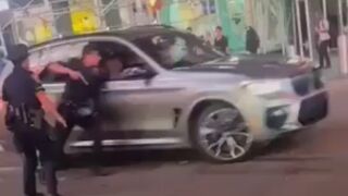 NYPD Officer Hit, Dragged by Speeding Car in Times Square