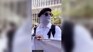 Swastika wearing protestors against Israel occupation and destruction of Palestine