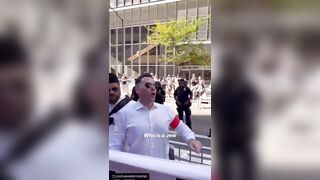 Swastika wearing protestors against Israel occupation and destruction of Palestine
