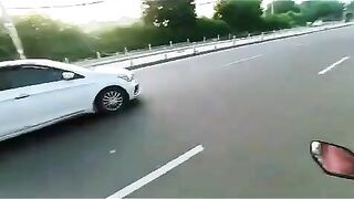 Woman On Sports Bike Hit By Car For Asking Driver To Stay Away