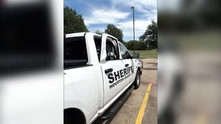 Handcuffed suspect kicks out window, escapes moving patrol truck