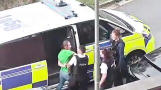 BELGIUM COP SLAPS WOMAN in CUFFS FEMALE OFFICERS DO NOTHING