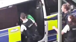 BELGIUM COP SLAPS WOMAN in CUFFS FEMALE OFFICERS DO NOTHING