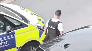 BELGIUM COP SLAPS WOMAN in CUFFS FEMALE OFFICERS DO NOTHING