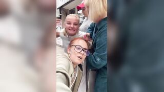 unhinged blonde woman attacked a young woman on the street for no reason