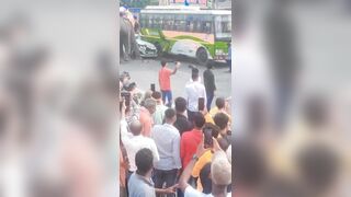 A furious elephant caught stomping on and damaging a car