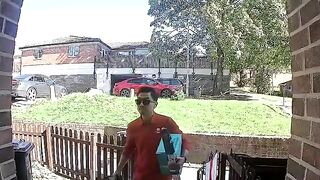 DISGUSTING: Foreign Royal Mail worker SPITS on England flag