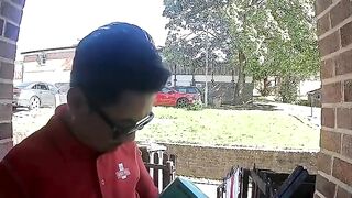 DISGUSTING: Foreign Royal Mail worker SPITS on England flag