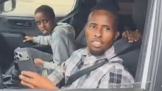 Man With "Deport All Somali" Sign Confronts Somali In in St. Cloud, Minnesota