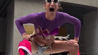 Transgender man stands on top of an NYPD car and screams “Free Palestine”