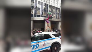 Transgender man stands on top of an NYPD car and screams “Free Palestine”