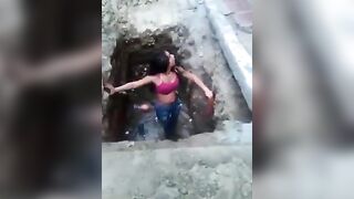 Poor Girl Ends up in the Sewer during Street Fight