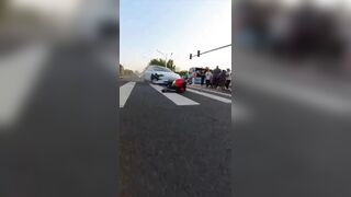 Oblivious Female Driver in a Tesla Ruins Bikers Day.