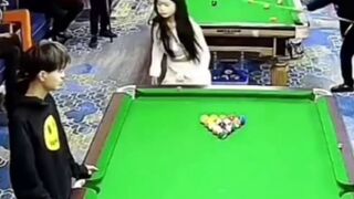 Pool Hall Girl is hit not Once, but Twice by Flying Que Balls