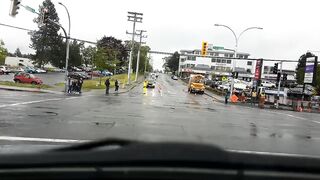 A traffic director walks into a vehicle and acts like she got hit