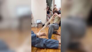 Non-binary women put on bizarre ‘modern art’ performance while crawling on the floor