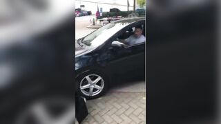 He spits on the Trump flag, speeds off, plows into a pole, cops show up.