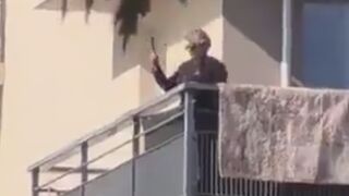 Chaos in France, as a woman came out onto her balcony with a gun to drive away rioters