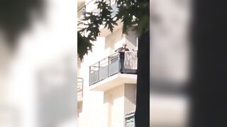 Chaos in France, as a woman came out onto her balcony with a gun to drive away rioters